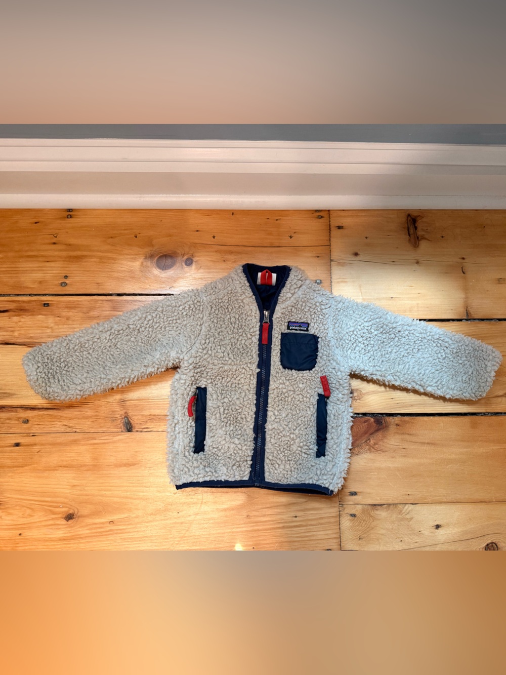 Patagonia Kids Cream Sherpa Jacket with Navy Trim and Red Accents
